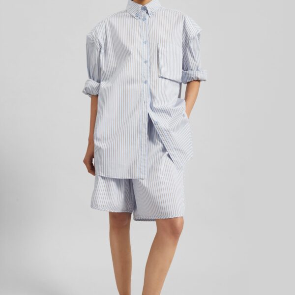 The Frankie Shop Elyn Cotton Bermuda Shorts - Light Blue/Brown Stripe - Oversized Minimalist Shorts in Multicolour - Shop at Coveti