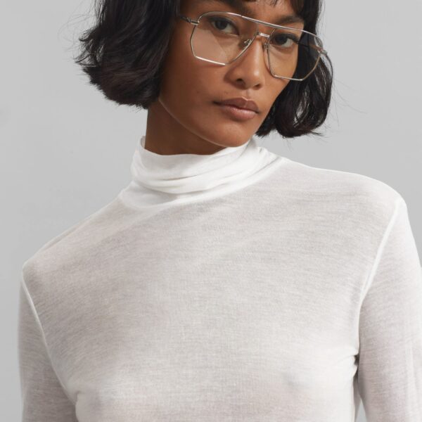 The Frankie Shop Evren Sheer Turtleneck - White - Oversized Minimalist Knitwear in White - Shop at Coveti