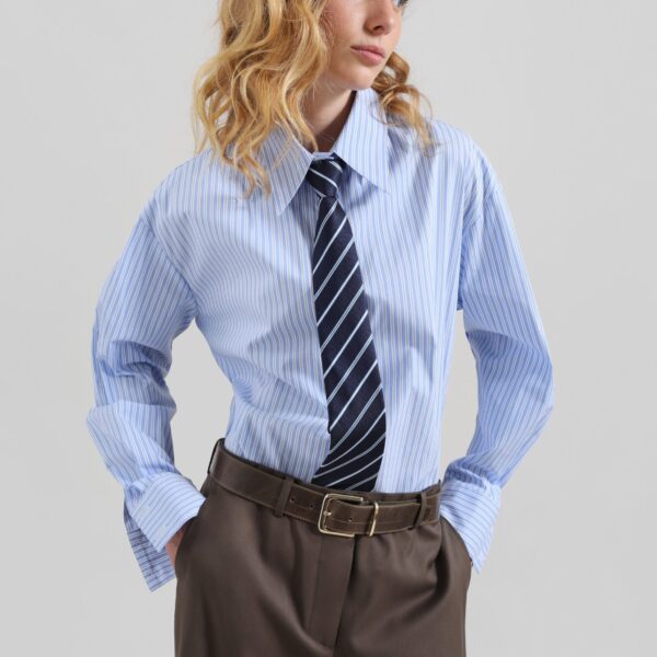 The Frankie Shop Gainsford Neck Tie Shirt - Blue/White Stripe - Oversized Minimalist Tops in Multicolour - Shop at Coveti
