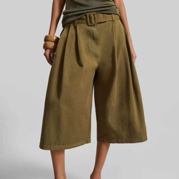The Frankie Shop Garment Dye Pleated Culotte - Avocado - Oversized Minimalist Shorts in Green - Shop at Coveti
