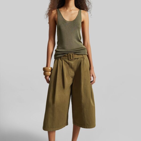 The Frankie Shop Garment Dye Pleated Culotte - Avocado - Oversized Minimalist Shorts in Green - Shop at Coveti