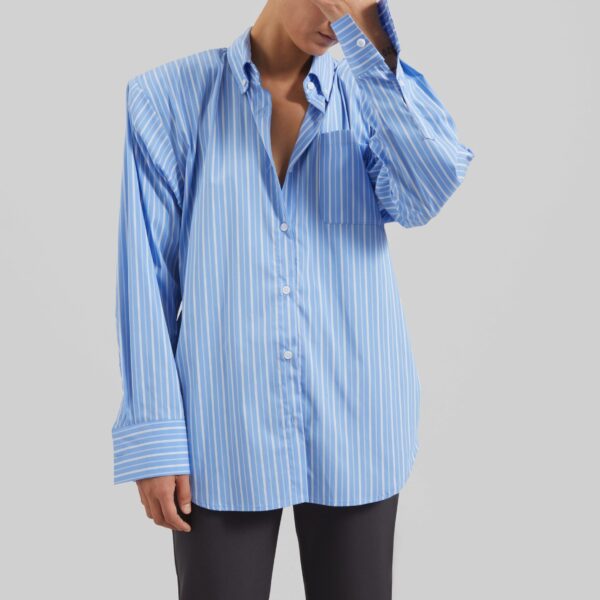 The Frankie Shop Heaton Double-Sleeve Padded Shirt - Blue/White Stripe - Oversized Minimalist Tops in Multicolour - Shop at Coveti