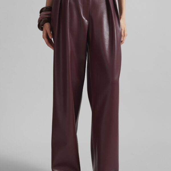 The Frankie Shop Helsinki Faux Leather Pants - Burgundy - Oversized Minimalist Pants in Red - Shop at Coveti