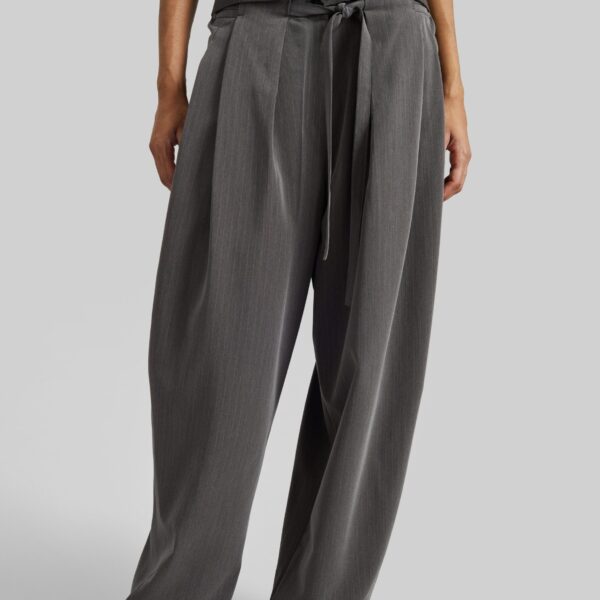 The Frankie Shop Loire Curved Pants - Charcoal Pinstripe - Oversized Minimalist Pants in Multicolour - Shop at Coveti