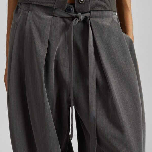 The Frankie Shop Loire Curved Pants - Charcoal Pinstripe - Oversized Minimalist Pants in Multicolour - Shop at Coveti