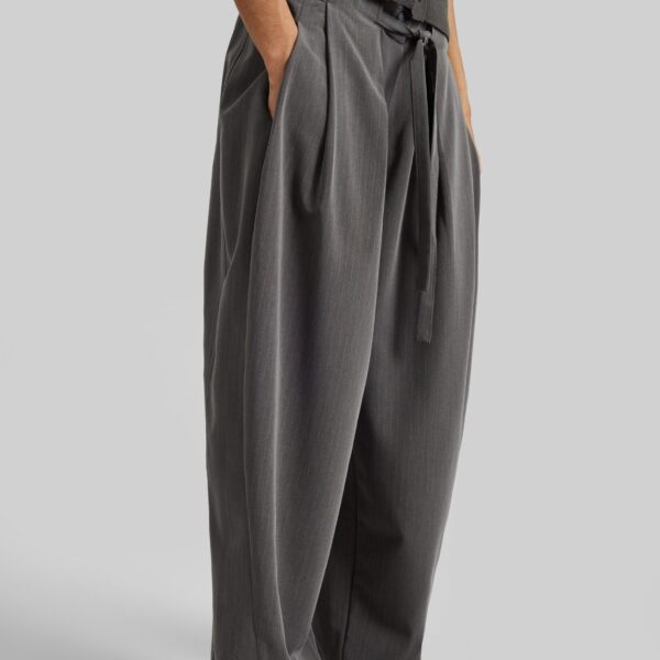 The Frankie Shop Loire Curved Pants - Charcoal Pinstripe - Oversized Minimalist Pants in Multicolour - Shop at Coveti