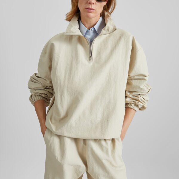 The Frankie Shop Majvik Windbreaker Anorak - Light Beige - Oversized Minimalist Jackets in Beige - Shop at Coveti
