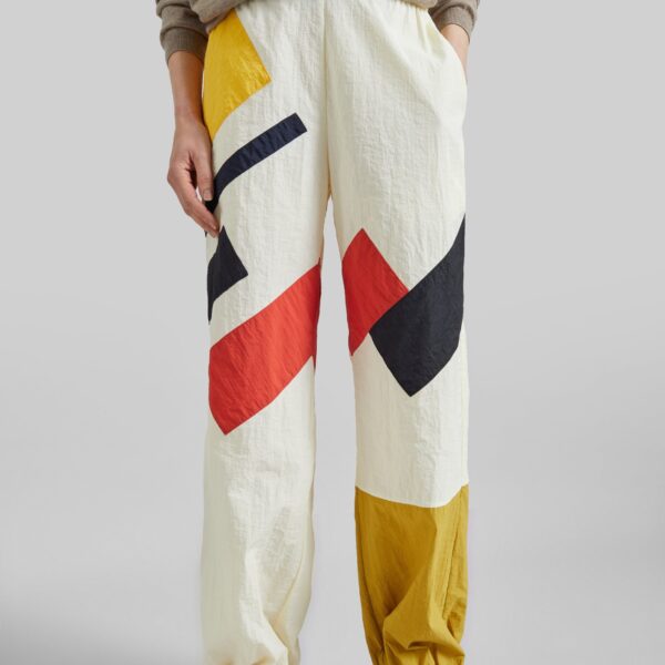 The Frankie Shop Malevich Track Pants - Vanilla - Oversized Minimalist Pants in Ivory - Shop at Coveti