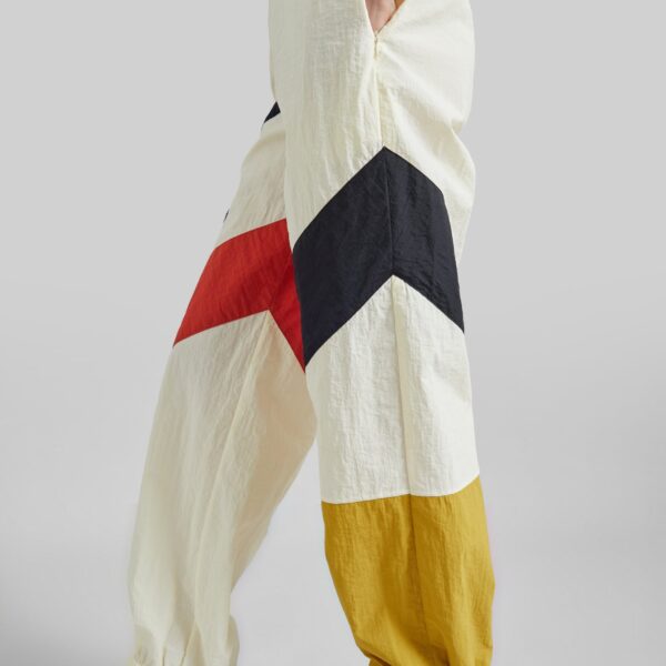 The Frankie Shop Malevich Track Pants - Vanilla - Oversized Minimalist Pants in Ivory - Shop at Coveti