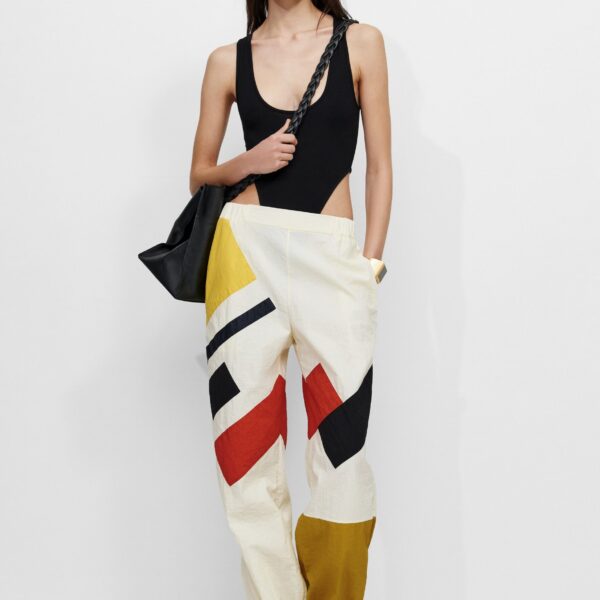 The Frankie Shop Malevich Track Pants - Vanilla - Oversized Minimalist Pants in Ivory - Shop at Coveti