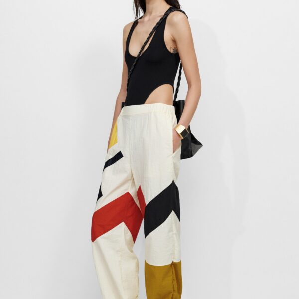 The Frankie Shop Malevich Track Pants - Vanilla - Oversized Minimalist Pants in Ivory - Shop at Coveti