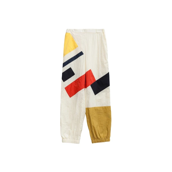 The Frankie Shop Malevich Track Pants - Vanilla - Oversized Minimalist Pants in Ivory - Shop at Coveti