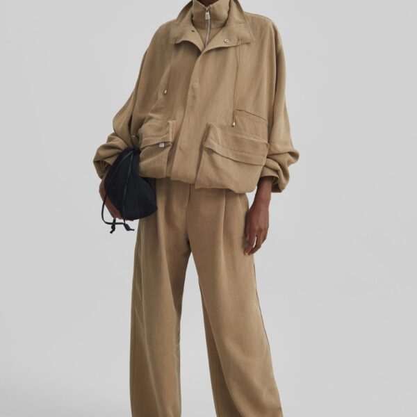 The Frankie Shop Marfa Linen Pleated Trousers - Camel - Oversized Minimalist Pants in Beige - Shop at Coveti