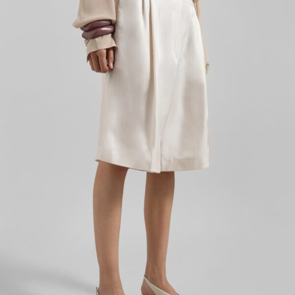 The Frankie Shop Marfa Pleated Silk Bermuda Shorts - Ivory - Oversized Minimalist Shorts in Ivory - Shop at Coveti