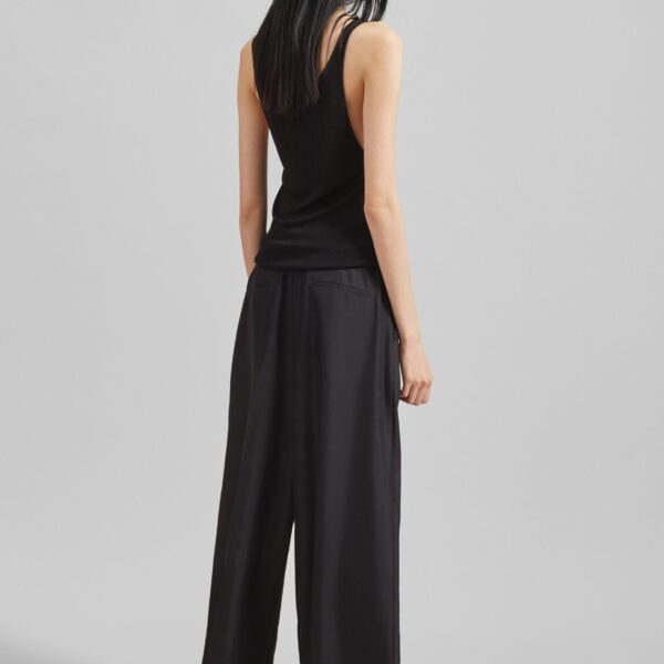 The Frankie Shop Marfa Pleated Silk Trousers - Black - Oversized Minimalist Pants in Black - Shop at Coveti