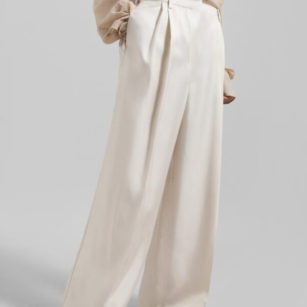 The Frankie Shop Marfa Pleated Silk Trousers - Ivory - Oversized Minimalist Pants in Ivory - Shop at Coveti