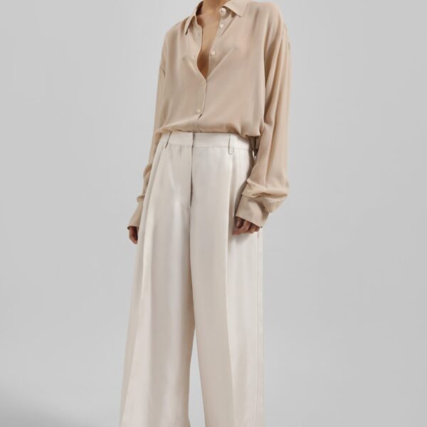 The Frankie Shop Marfa Pleated Silk Trousers - Ivory - Oversized Minimalist Pants in Ivory - Shop at Coveti