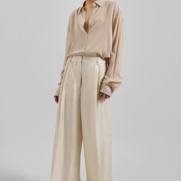The Frankie Shop Marfa Pleated Silk Trousers - Light Beige - Oversized Minimalist Pants in Beige - Shop at Coveti