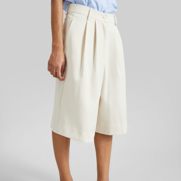 The Frankie Shop Martel Pleated Bermuda Shorts - Cream - Oversized Minimalist Shorts in Ivory - Shop at Coveti