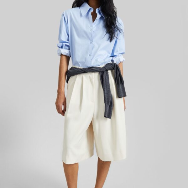 The Frankie Shop Martel Pleated Bermuda Shorts - Cream - Oversized Minimalist Shorts in Ivory - Shop at Coveti