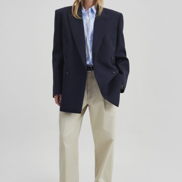 The Frankie Shop Norstrand Cotton Chino Trousers - Light Beige - Oversized Minimalist Pants in Beige - Shop at Coveti