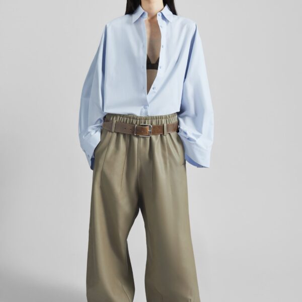 The Frankie Shop Oakdale Faux Leather Track Pants - Sage - Oversized Minimalist Pants in Green - Shop at Coveti