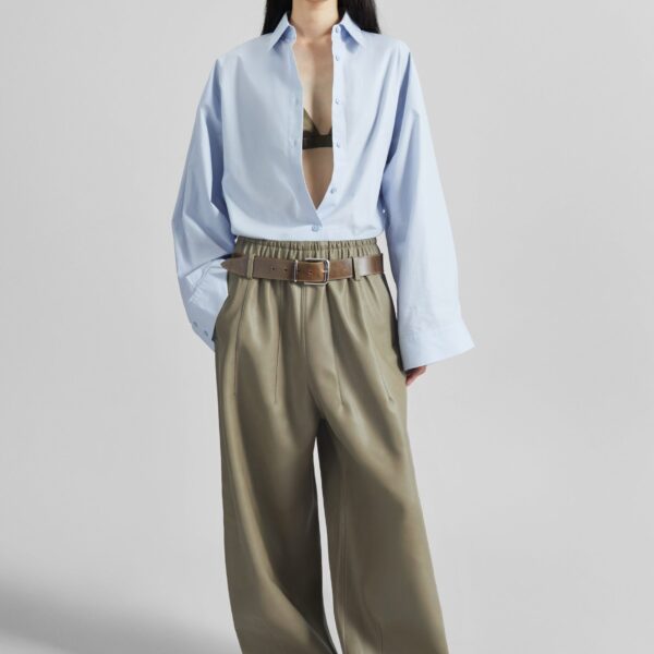 The Frankie Shop Oakdale Faux Leather Track Pants - Sage - Oversized Minimalist Pants in Green - Shop at Coveti