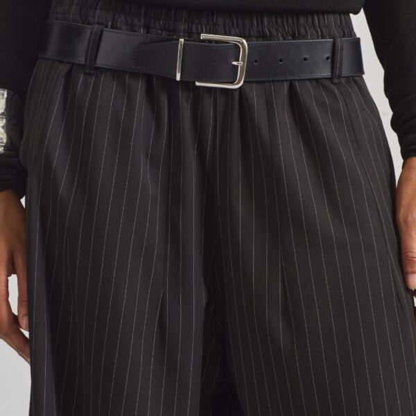 The Frankie Shop Oakdale Track Pants - Black/White Pinstripe - Oversized Minimalist Pants in Multicolour - Shop at Coveti