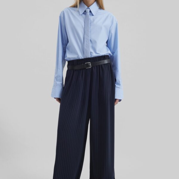 The Frankie Shop Oakdale Track Pants - Navy/White Pinstripe - Oversized Minimalist Pants in Multicolour - Shop at Coveti