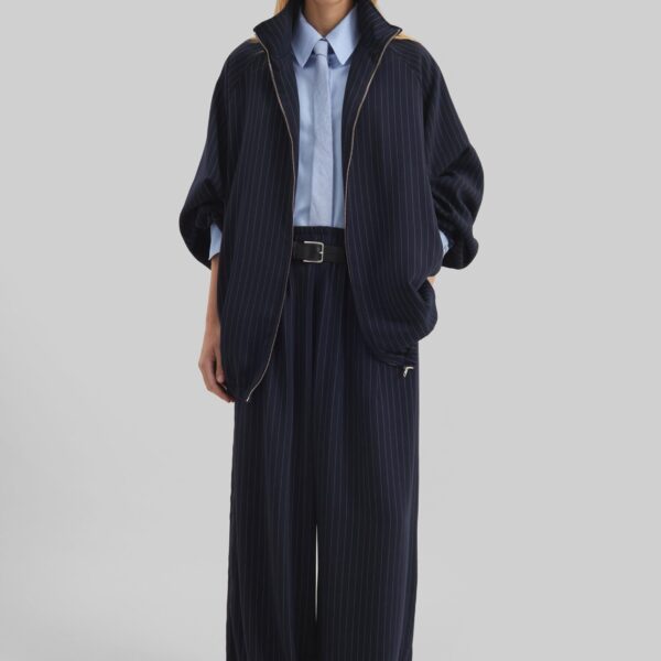 The Frankie Shop Oakdale Track Pants - Navy/White Pinstripe - Oversized Minimalist Pants in Multicolour - Shop at Coveti