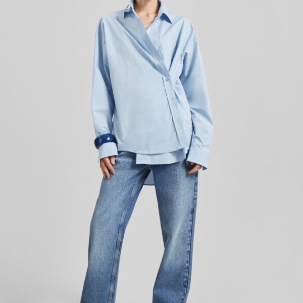 The Frankie Shop Ornella Side Button-Up Shirt - Light Blue - Oversized Minimalist Tops in Blue - Shop at Coveti