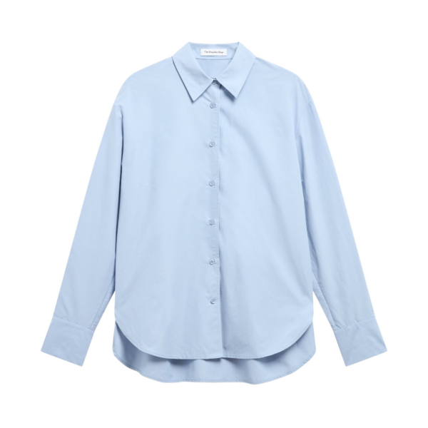 The Frankie Shop Ornella Side Button-Up Shirt - Light Blue - Oversized Minimalist Tops in Blue - Shop at Coveti