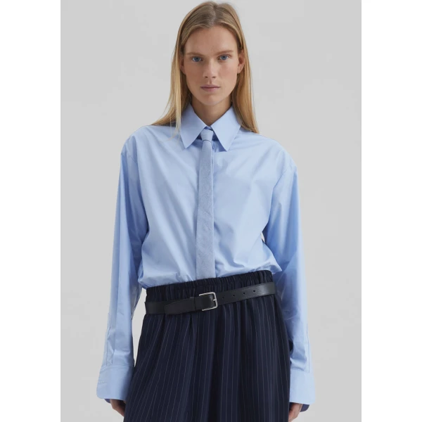 The Frankie Shop Peri Cotton Shirt - Light Blue - Oversized Minimalist Tops in Blue - Shop at Coveti