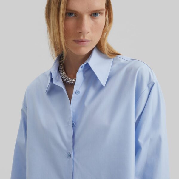 The Frankie Shop Peri Cotton Shirt - Light Blue - Oversized Minimalist Tops in Blue - Shop at Coveti