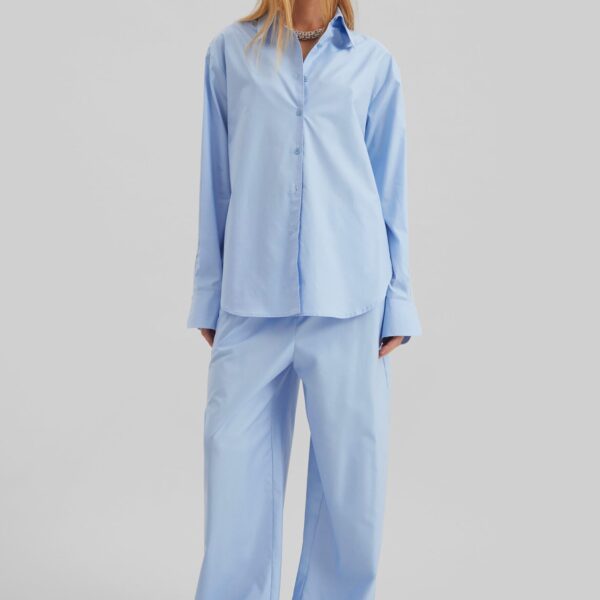 The Frankie Shop Peri Cotton Shirt - Light Blue - Oversized Minimalist Tops in Blue - Shop at Coveti