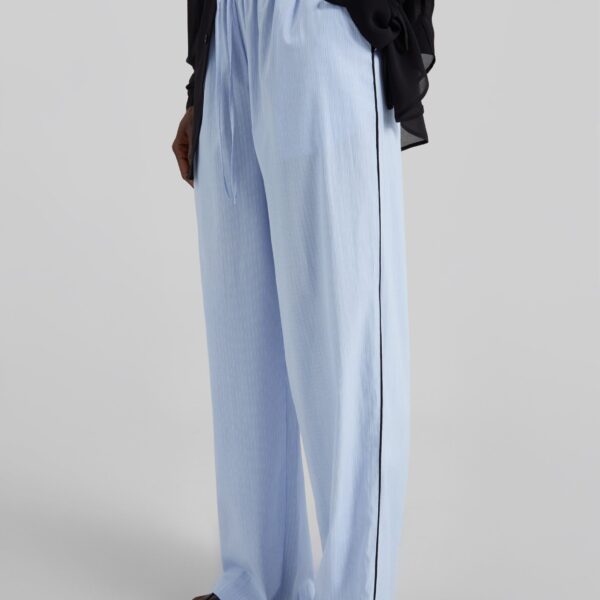 The Frankie Shop Porto Contrast Piped Pants - Blue/White Stripe - Oversized Minimalist Pants in Multicolour - Shop at Coveti