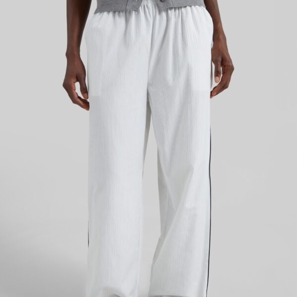 The Frankie Shop Porto Contrast Piped Pants - White/Black Stripe - Oversized Minimalist Pants in Multicolour - Shop at Coveti