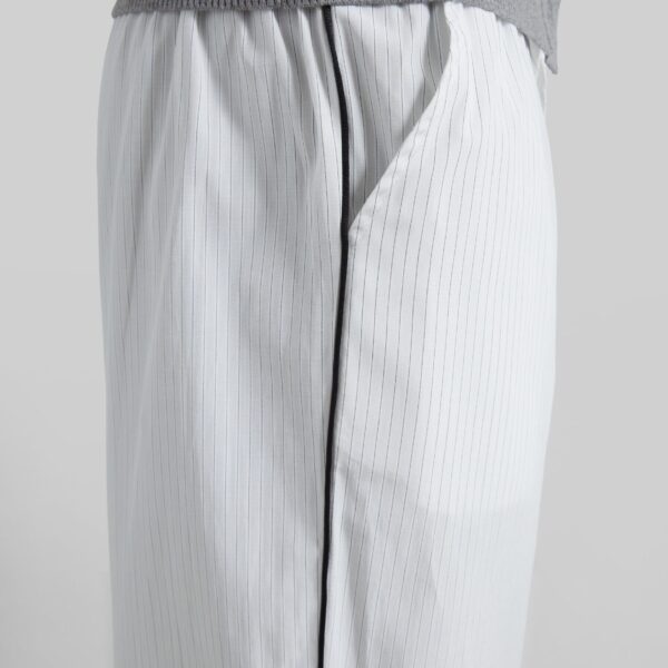 The Frankie Shop Porto Contrast Piped Pants - White/Black Stripe - Oversized Minimalist Pants in Multicolour - Shop at Coveti