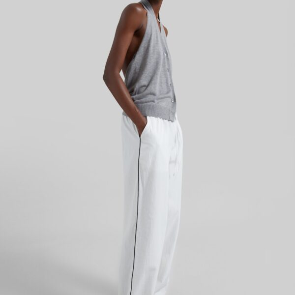 The Frankie Shop Porto Contrast Piped Pants - White/Black Stripe - Oversized Minimalist Pants in Multicolour - Shop at Coveti