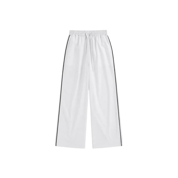 The Frankie Shop Porto Contrast Piped Pants - White/Black Stripe - Oversized Minimalist Pants in Multicolour - Shop at Coveti