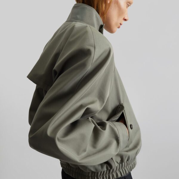 The Frankie Shop Rennes Curved Blouson Jacket - Sage - Oversized Minimalist Jackets in Green - Shop at Coveti
