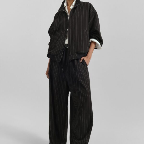 The Frankie Shop Rilton Drawstring Pants - Black/White Pinstripe - Oversized Minimalist Pants in Multicolour - Shop at Coveti