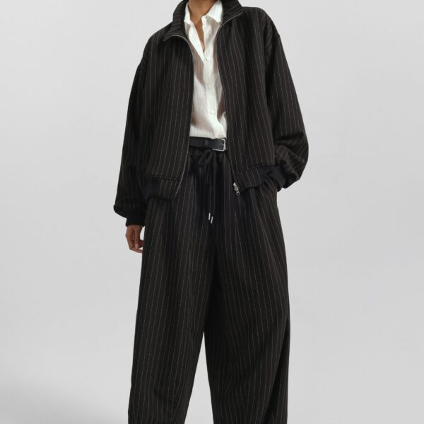 The Frankie Shop Rilton Drawstring Pants - Black/White Pinstripe - Oversized Minimalist Pants in Multicolour - Shop at Coveti