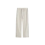 The Frankie Shop Sateen Pyjama Pants - Brown Pinstripe - Oversized Minimalist Loungewear in Multicolour - Shop at Coveti