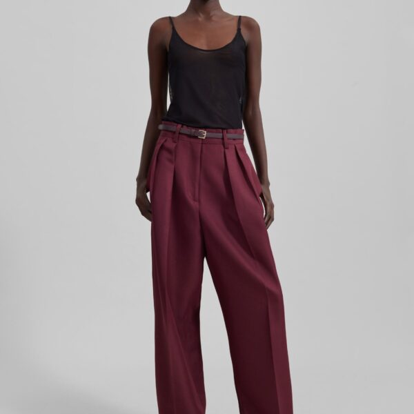 The Frankie Shop Tansy Pleated Trousers - Burgundy - Oversized Minimalist Pants in Red - Shop at Coveti