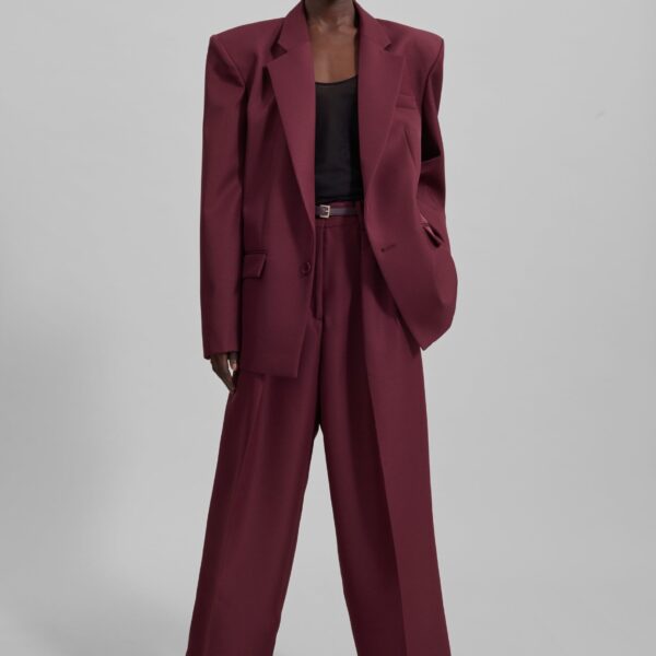 The Frankie Shop Tansy Pleated Trousers - Burgundy - Oversized Minimalist Pants in Red - Shop at Coveti