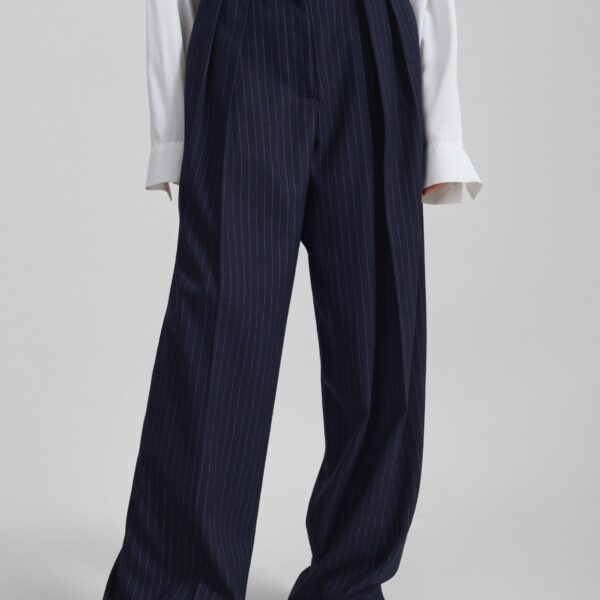 The Frankie Shop Tansy Pleated Trousers - Navy Pinstripe - Oversized Minimalist Pants in Multicolour - Shop at Coveti