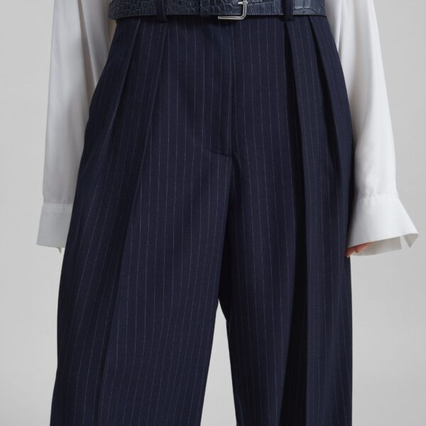 The Frankie Shop Tansy Pleated Trousers - Navy Pinstripe - Oversized Minimalist Pants in Multicolour - Shop at Coveti