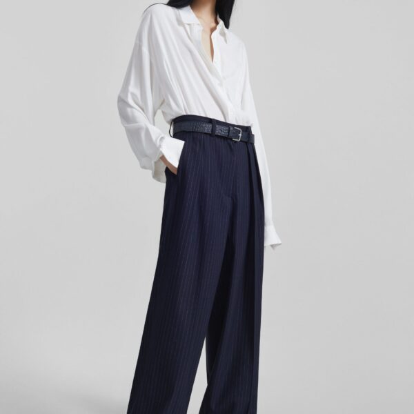 The Frankie Shop Tansy Pleated Trousers - Navy Pinstripe - Oversized Minimalist Pants in Multicolour - Shop at Coveti