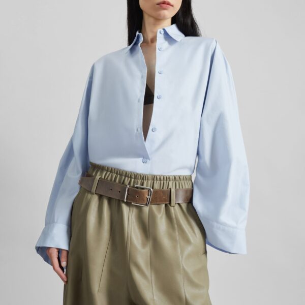The Frankie Shop Tila Wide Sleeve Shirt - Light Blue - Oversized Minimalist Tops in Blue - Shop at Coveti